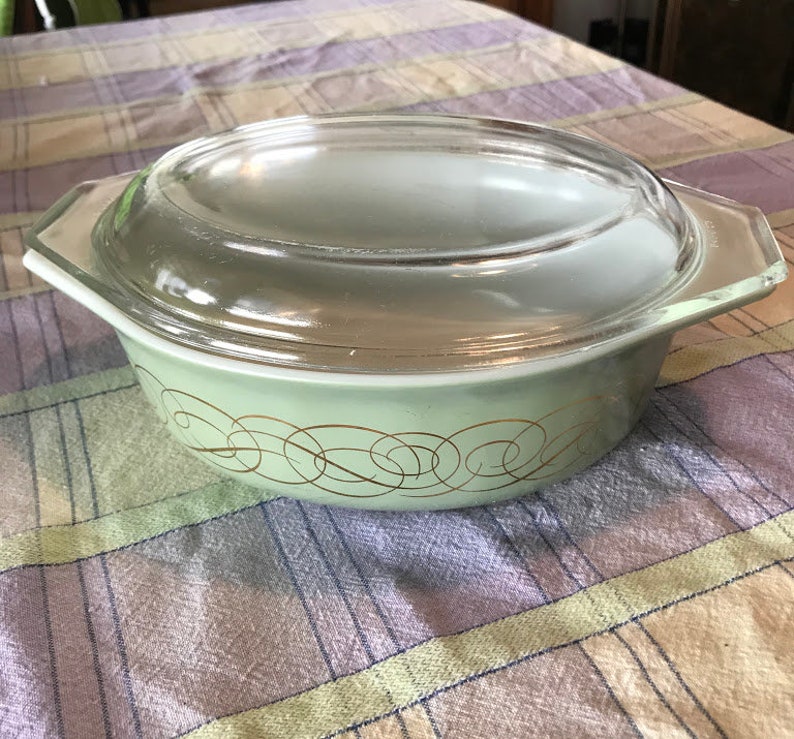 1959 Pyrex Golden Scroll promotional casserole with lid in sage green