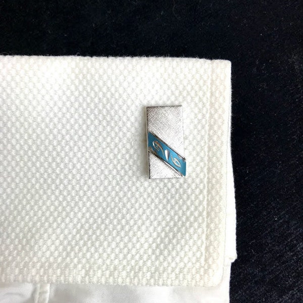 Vintage stainless Swank cufflinks with sky blue enamelled detail