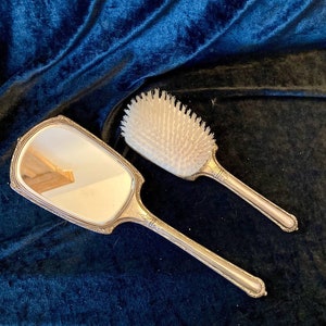 Antique Sterling silver hand mirror and hair brush image 2