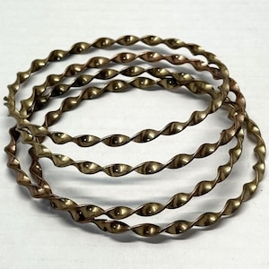 Vintage set of four bangle bracelets