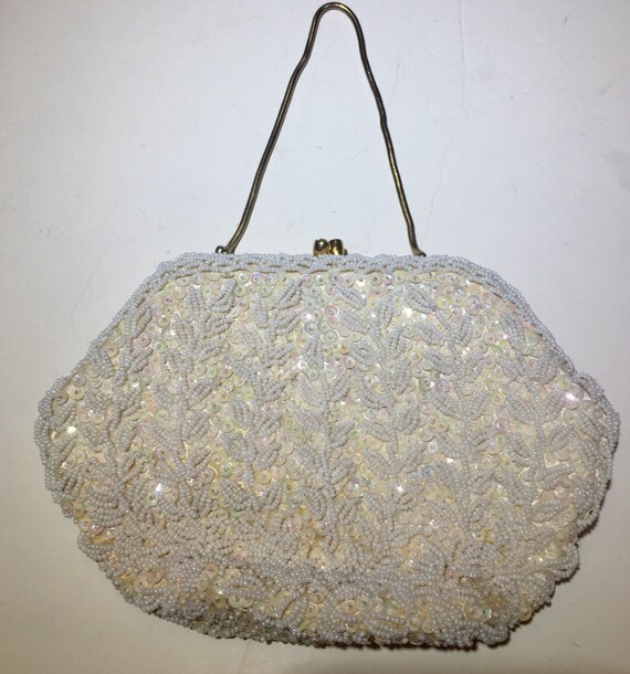 white beaded clutch bag