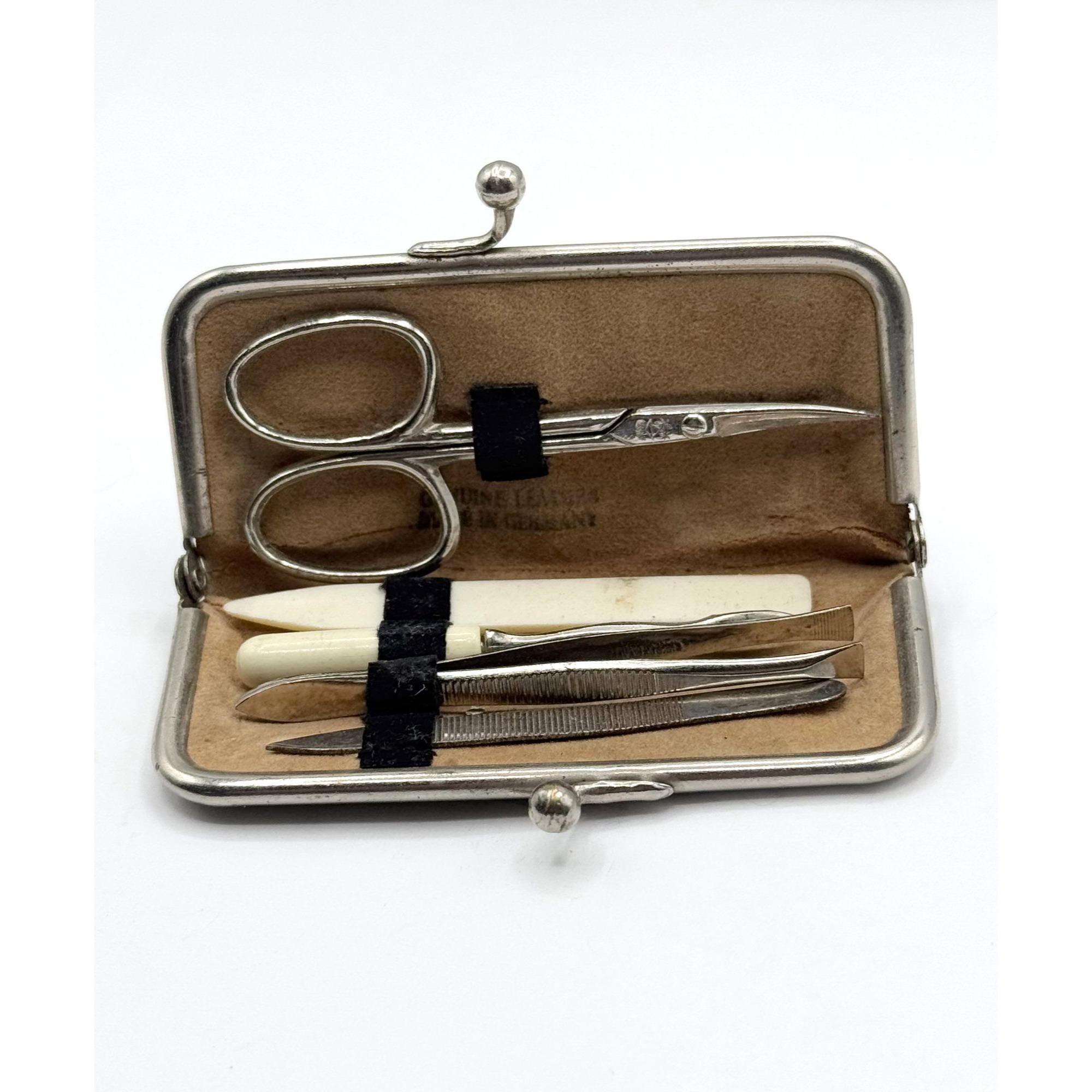 Vintage genuine leather made in Germany vanity nail kit in kiss lock case
