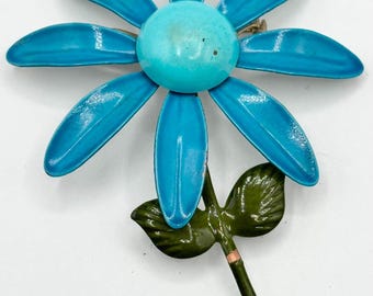 Broche vintage con forma de flor esmaltada en azul