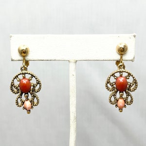 Brincos vintage com joias pendentes da Avon