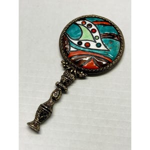 Vintage enamel hand mirror