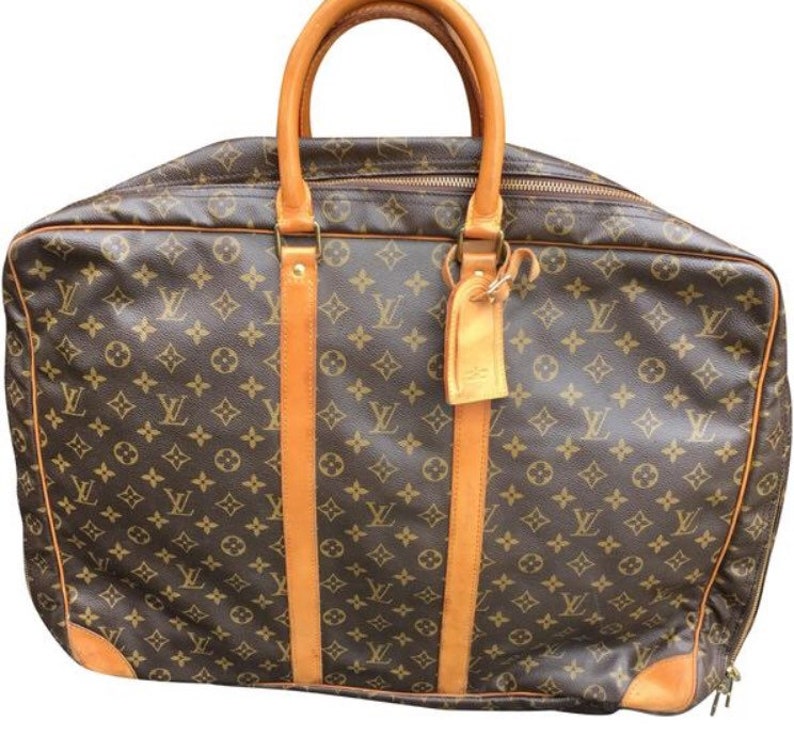 louis vuitton weekend bags