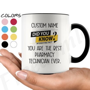 May include: White ceramic coffee mug with a black rim and handle. The mug has black text that reads "CUSTOM NAME DID YOU KNOW? INTERESTING FACT YOU ARE THE BEST PHARMACY TECHNICIAN EVER."
