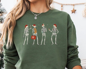Sudadera de esqueleto de enfermera navideña, linda camiseta de fiesta de esqueleto de enfermera registrada, regalo de camisa de enfermera de urgencias de atención médica de vacaciones de Navidad