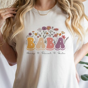 Kundenspezifisches Baba-Blumenhemd, personalisiertes Muttertags-T-Shirt, Baba mit Enkelnamen-Kleid, Geschenk für Großmutter von Kindern, gesegnetes Baba-T-Stück