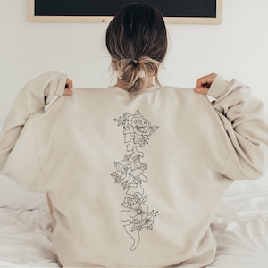 フローラル スパイン スウェットシャツ、Grow Through It プルオーバー、脊柱側弯症手術セーター、脊椎不安定性長袖、変性椎間板クルーネック