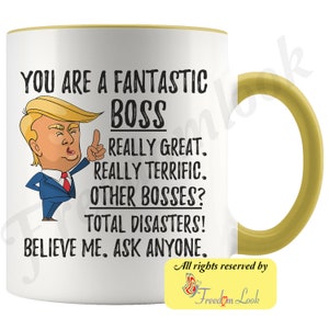 May include: White ceramic coffee mug with a yellow rim and handle. The mug features a cartoon image of a man with a thumbs up and the text "You are a fantastic boss. Really great. Really terrific. Other bosses? Total disasters! Believe me. Ask anyone."