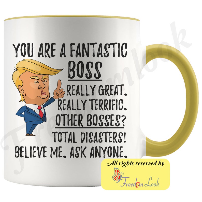 May include: White ceramic coffee mug with a yellow rim and handle. The mug features a cartoon image of a man with a thumbs up and the text "You are a fantastic boss. Really great. Really terrific. Other bosses? Total disasters! Believe me. Ask anyone."