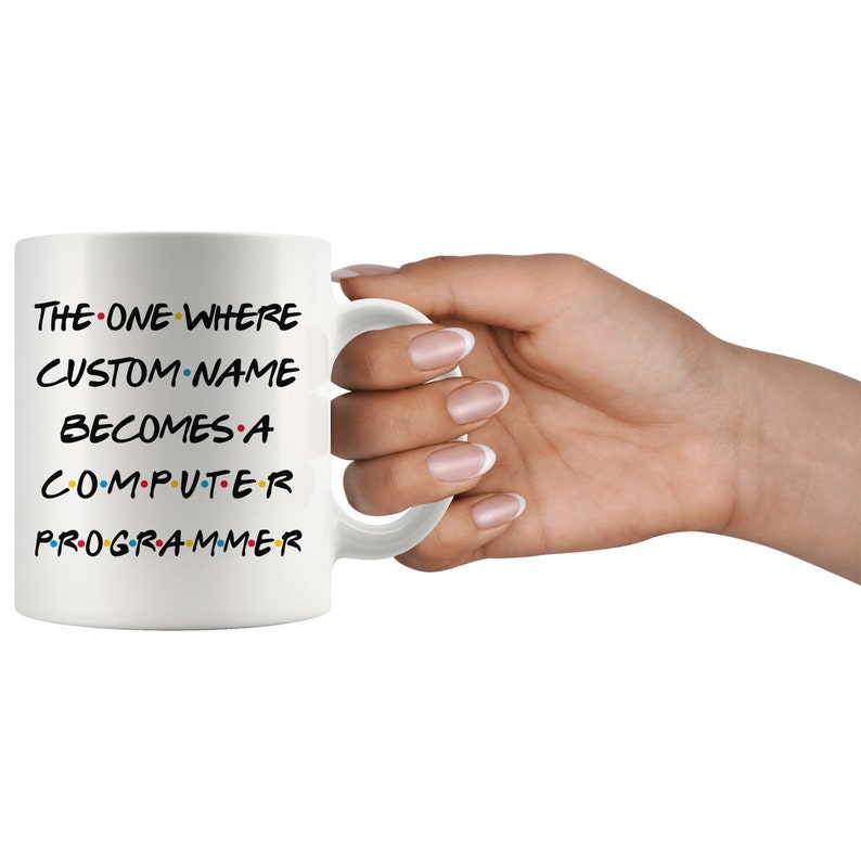 May include: White ceramic mug with black text that reads "The One Where CUSTOM NAME Becomes A Computer Programmer". The text is in a font similar to the popular TV show "Friends".