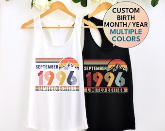 May include: A white and a black racerback tank top, each featuring a retro-style graphic with the text SEPTEMBER 1996 LIMITED EDITION, a mountain silhouette, and a sunset design. A circular overlay displays the text CUSTOM BIRTH MONTH/YEAR MULTIPLE COLORS.