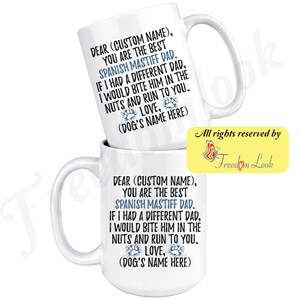 May include: White ceramic coffee mug with a blue and white paw print design. The mug has text that reads "Dear (Custom Name), You are the best Spanish Mastiff Dad. If I had a different dad, I would bite him in the nuts and run to you. Love, (Dog's Name Here)"