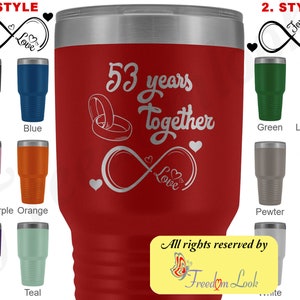 May include: Red stainless steel tumbler with a white inscription that reads "53 years together" with an infinity symbol and two rings. The tumbler is surrounded by smaller tumblers in various colors, including black, blue, light purple, orange, purple, teal, green, light blue, pewter, pink, and white.