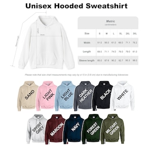 May include: A white hooded sweatshirt with a size chart displaying width, length, and sleeve length in centimetres for sizes S to 3XL. Below are eleven colour options labelled sand, light pink, light blue, dark heather, black, white, sport grey, maroon, navy, forest green, and military green.