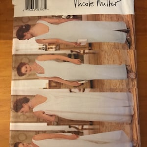 May include: A sewing pattern for a long, sleeveless dress with a V-neckline. The pattern is for sizes 14-16-18 and is by Butterick. The pattern is designed by Nicole Miller.