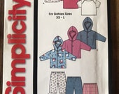 Simplicity 7054 baby clothes pattern.