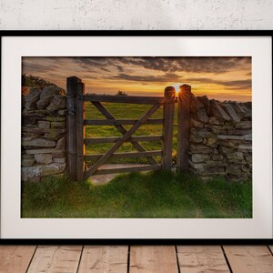White Nancy Bollington sunset  | Photograph | Cheshire | Sunset through a farm gate.Setting sun photo