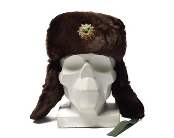 Original  East German NVA army winter hat. Grey military ushanka hat with badge Black, brown fur, green vinyl