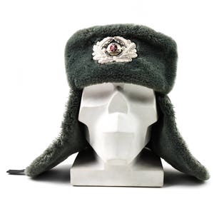 Original  East German NVA army winter hat. Grey military ushanka hat with badge