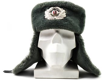 Original  East German NVA army winter hat. Grey military ushanka hat with badge