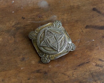 1910s Celtic star Wicca belt buckle in gold and silver