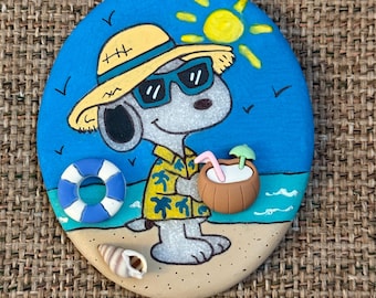 夏の犬が描かれた岩、密封済み3D。ビーチでの一日！