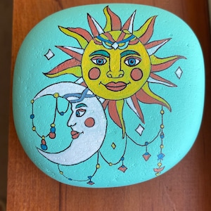 Sun and moon painted rock SEALED
