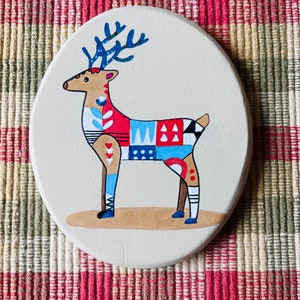 Whimsical Reindeer painted rock SEALED