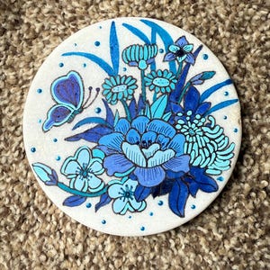 Blue connoisseur flowers and butterfly painted rock SEALED painted rocks