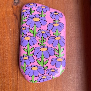 Purple flowers painted rock SEALED on thin Santorini