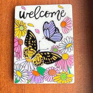 Welcome Butterflies and daisies painted rock SEALED