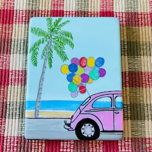Cruising through paradise with balloons painted rock SEALED