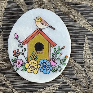 Bird on gold birdhouse painted rock SEALED