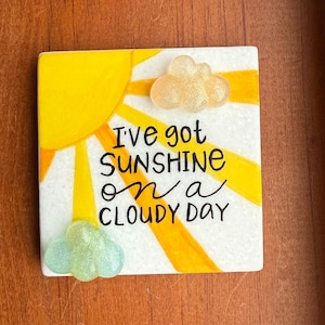 I’ve got sunshine painted rock SEALED 3D clouds