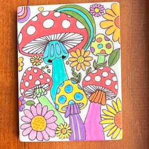 Groovy Mushrooms and flowers painted rock SEALED