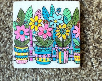 Whimsical flowers painted rock SEALED
