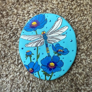 Dragonfly among blue poppies Painted Rock SEALED painted rocks