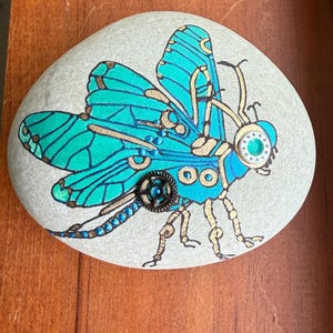 Steampunk Dragonfly painted rock SEALED featuring color shift paint 3D