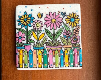 Whimsical flowers painted rock SEALED