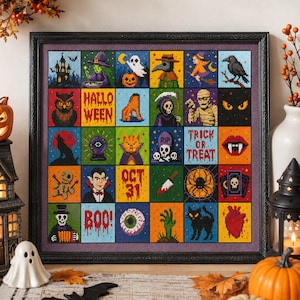 May include: A framed Halloween-themed cross-stitch sampler featuring a grid of colorful squares with spooky images like a witch, ghost, and vampire. The sampler includes the text "Halloween" and "Trick or Treat". The frame is black.