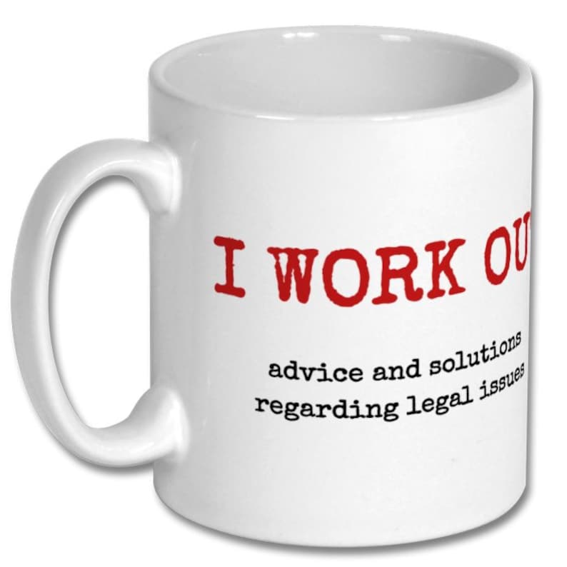 May include: White ceramic coffee mug with a red inscription that reads "I WORK OUT advice and solutions regarding legal issues".
