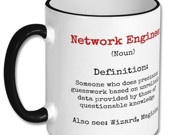 May include: White coffee mug with a black handle and black rim. The mug has a red and black design that says "Network Engineer (Noun)" and defines the term as "Someone who does precision guesswork based on unreliable data provided by those of questionable knowledge. Also see: Wizard, Magician."