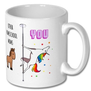 May include: White ceramic coffee mug with a unicorn holding a pole and the text "Other Homeschool Moms" and "You" in pink letters. The unicorn has a rainbow mane and tail.