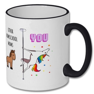 May include: White ceramic coffee mug with a black rim and handle. The mug features a cartoon unicorn with a rainbow tail and mane, holding onto a pole. The text "Other Homeschool Moms" and "You" are printed on the mug.