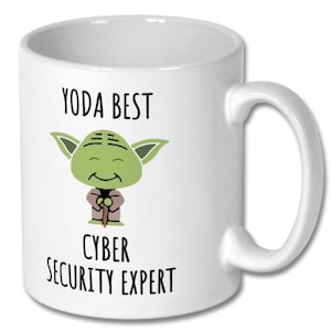 May include: White ceramic mug featuring a green cartoon Yoda character holding a stick. The text "YODA BEST CYBER SECURITY EXPERT" is printed on the mug.