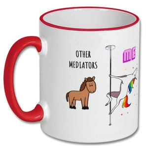 May include: White ceramic coffee mug with a red rim and handle. The mug features a cartoon illustration of a unicorn on a pole dancing, with the text "ME" above it. Below the unicorn is a brown horse with the text "OTHER MEDIATORS" above it.