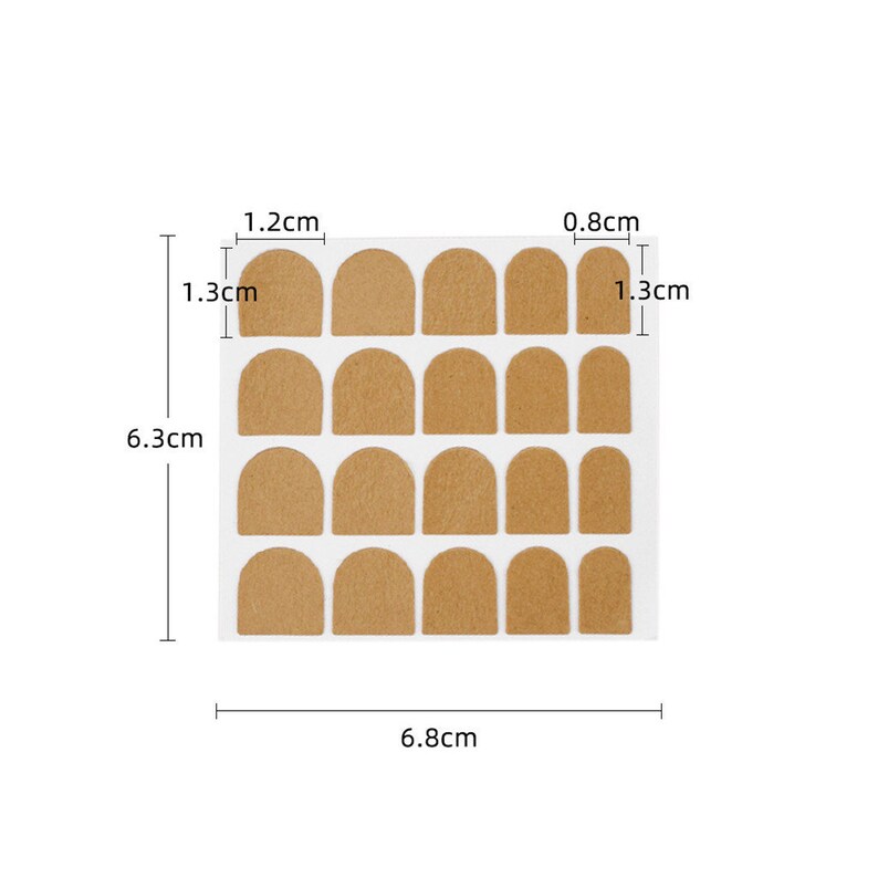 K&ouml;nnte beinhalten: Ein Bogen mit braunen, bogenf&ouml;rmigen Nagelaufklebern. Die Aufkleber sind in Reihen und Spalten auf wei&szlig;em Hintergrund angeordnet. Das Blatt ist 6,8 cm breit und 6,3 cm hoch. Einzelne Aufkleber sind 1,2 cm und 0,8 cm breit und 1,3 cm hoch.